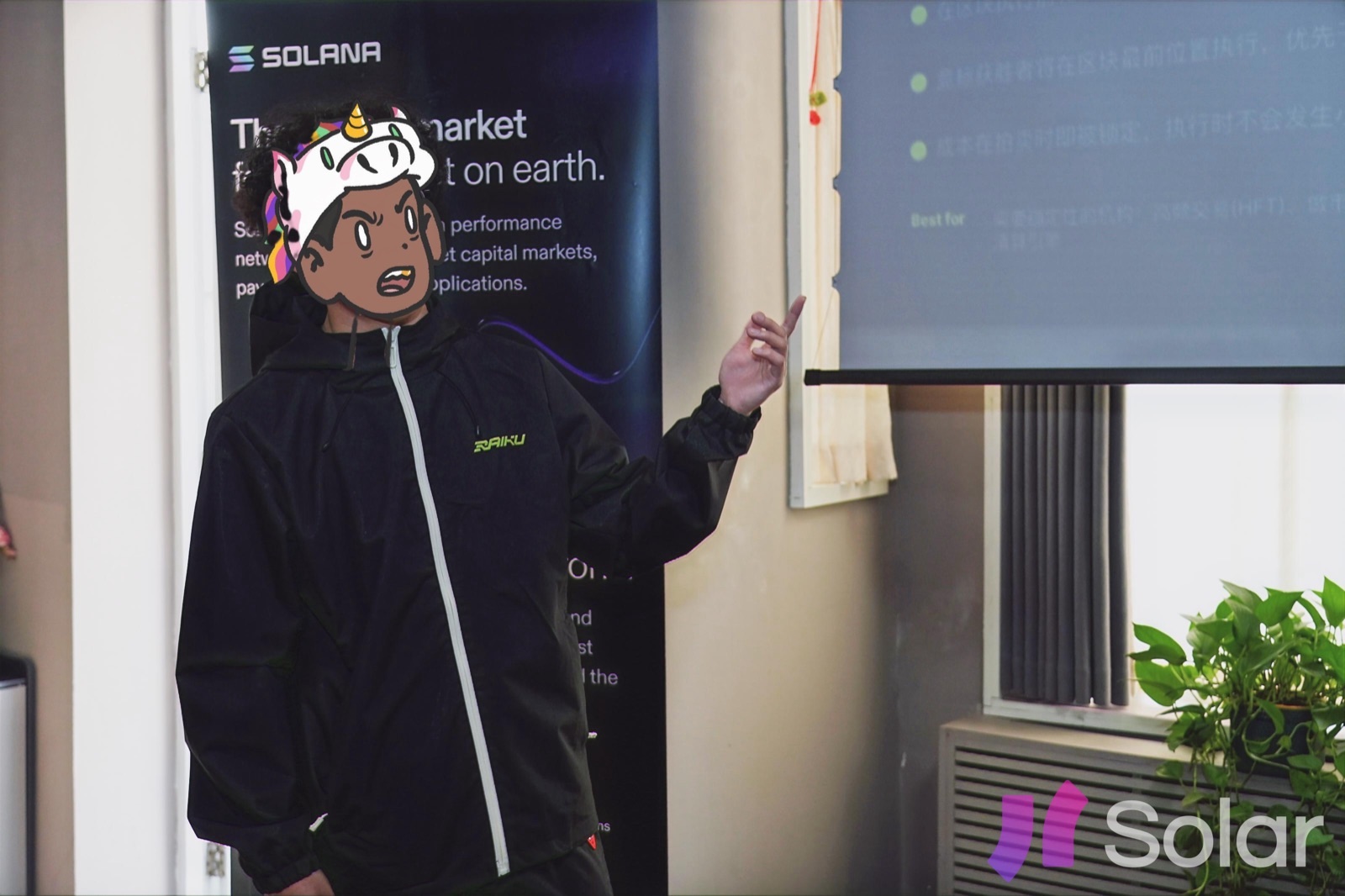 Speaker presenting beside Solana and Raiku signage